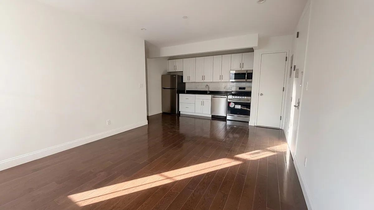 Building Photo - 6823 3rd Ave #2