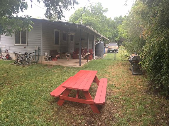 back patio, spacious shaded back yard