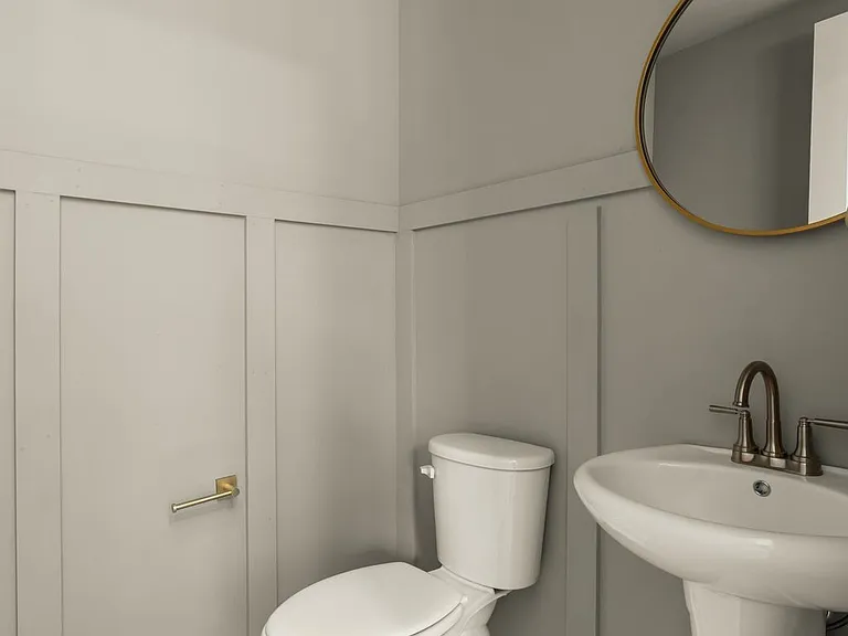 1/2 Bath on main living floor. (Middle Floor)