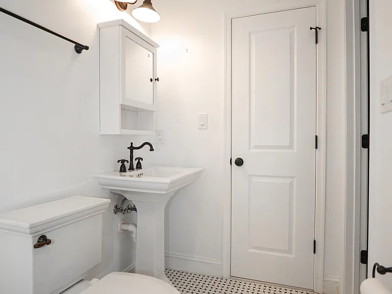 Full Bathroom with Modern Vanity and Storage