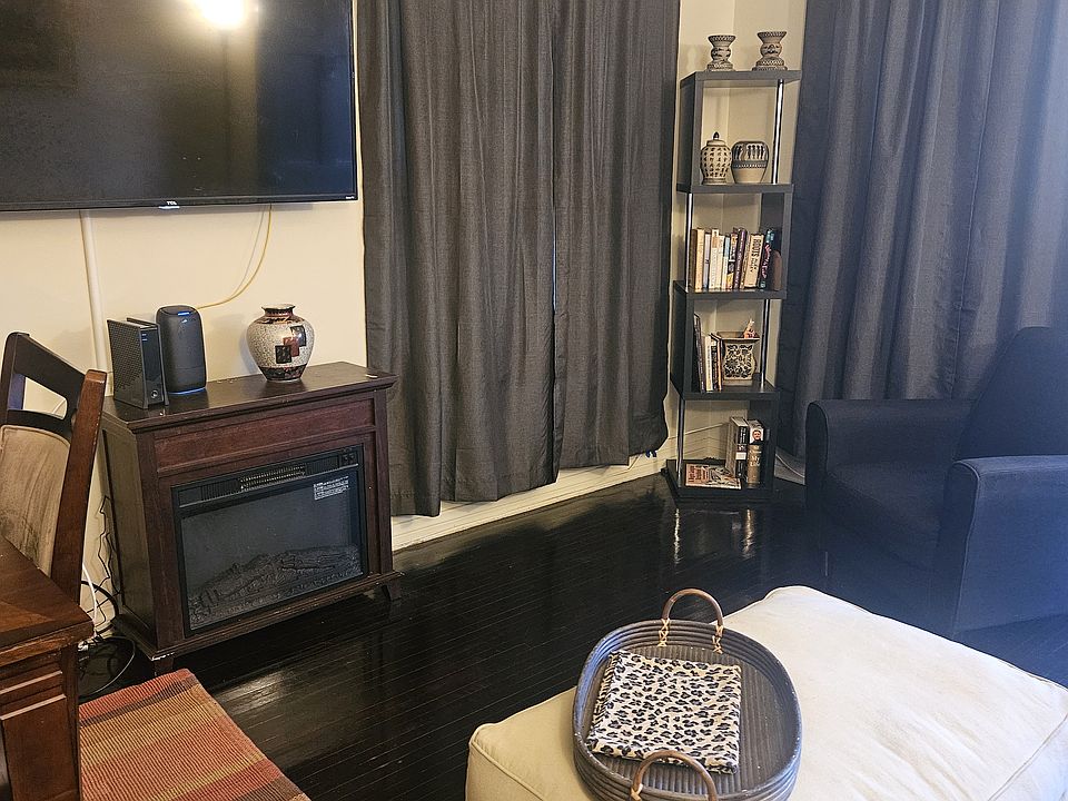 Living room, 55" TV with WiFi, cable, fireplace. Books, hardwood, comfortable seating, cozy, quiet and peaceful!