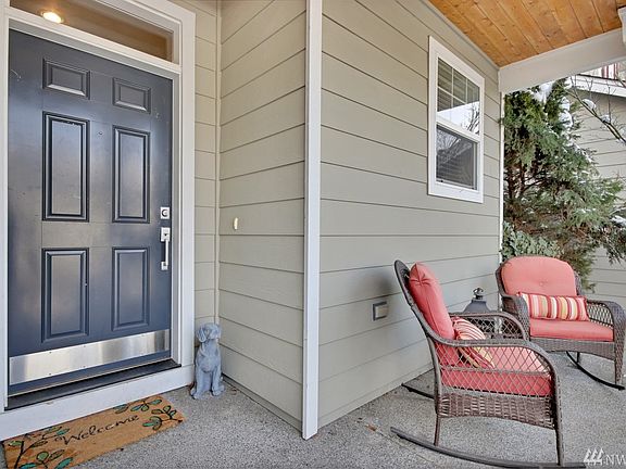 Covered porch invites you to the welcoming entry.