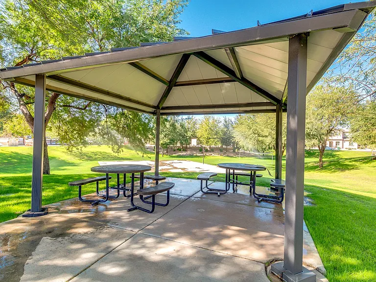 Ramadas with picnic tables and benches.