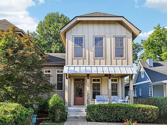 Cozy front porch with stylish seating and ceiling fan_perfect for morning coffee or evening chats in the heart of 12 South, just minutes to Belmont and Vanderbilt!