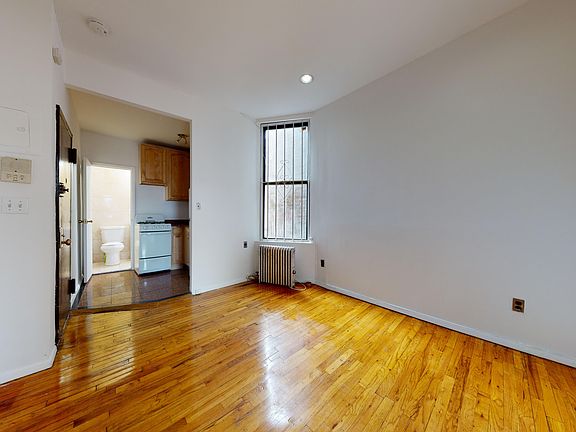 3rd image of 214 E 10th St APT 21