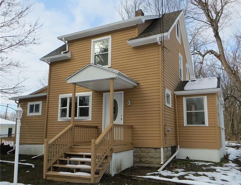 Front of house new paint and roof.