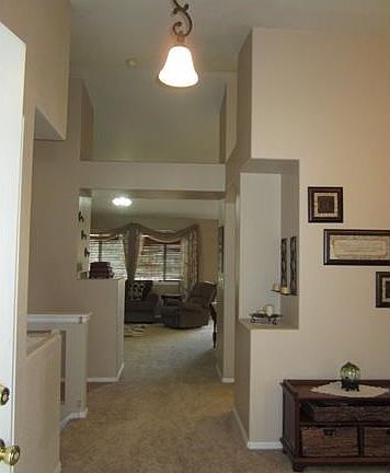 Front Entryway into Home - Living Room is on the right, and Family Room is straight ahead