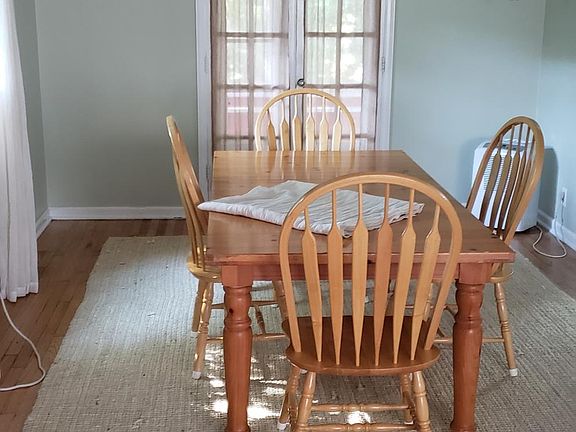 Large dining room, french doors access 3 seasons room