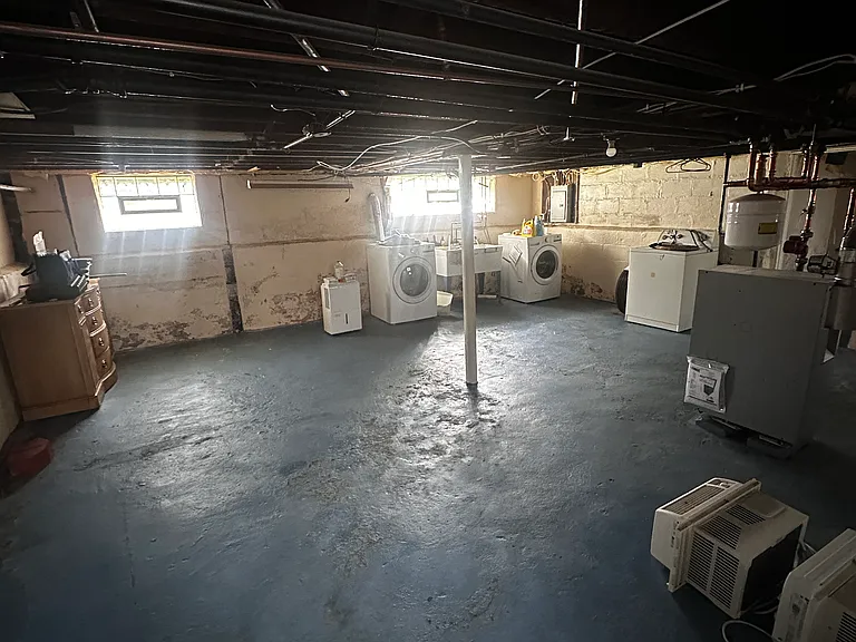 Basement. Washer and Dryer in Unit. 2 Window AC units included.