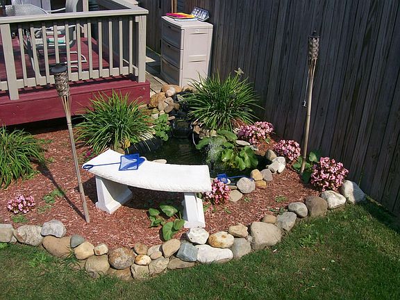 Small goldfish pond and new deck.