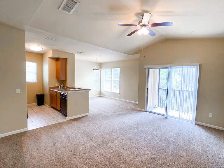 Open Concept Design with Lush Carpet in the Living and Dining Rooms Open Concept Design with Lush Carpet in the Living and Dining Rooms