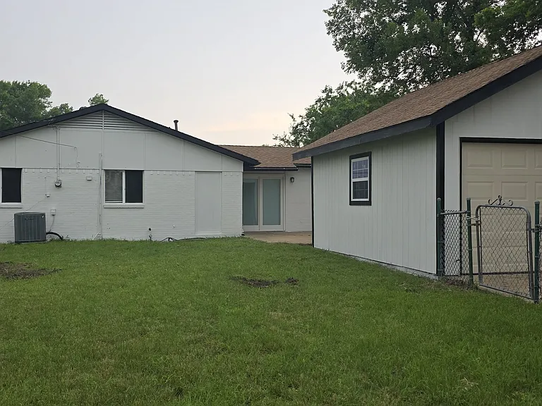 huge back yard with 2 car detached garage