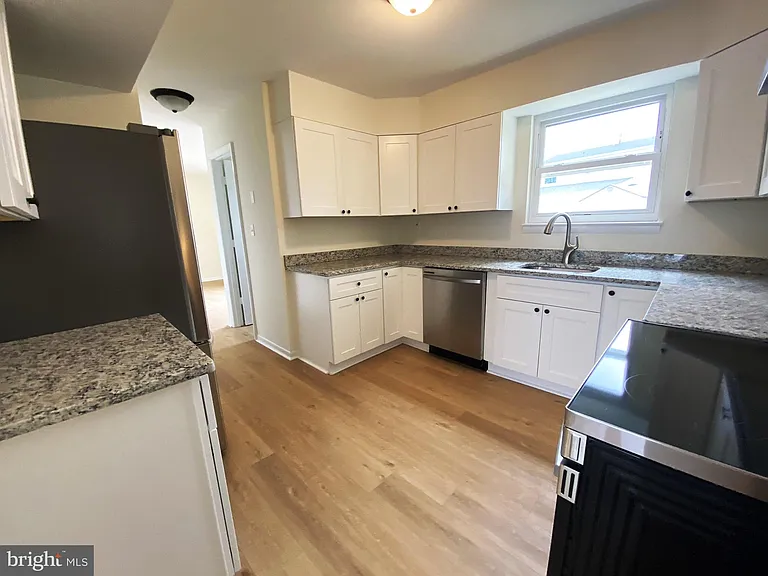 7707 Queens Park Rd — Photo 11