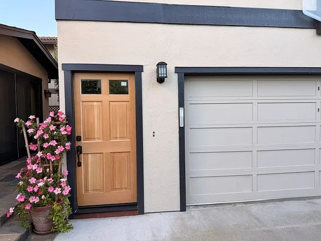 Brand new door and entryway. Washer and dryer located in the garage. Homeowner uses garage as storage for bikes and other items. Tenant can store a few items here, but keep in mind garage is opened and closed often.