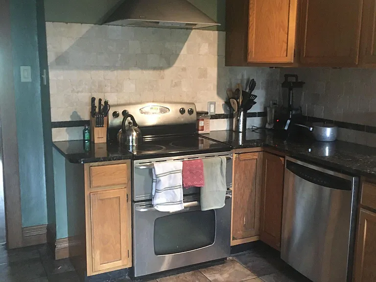 Stainless, tile, and granite in the kitchen!
Appliances include: Fridge, microwave, stove, dishwasher, and garbage disposal.
