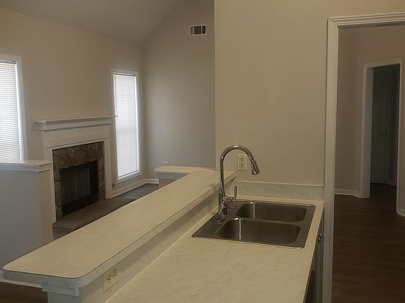 Kitchen view into living room area.