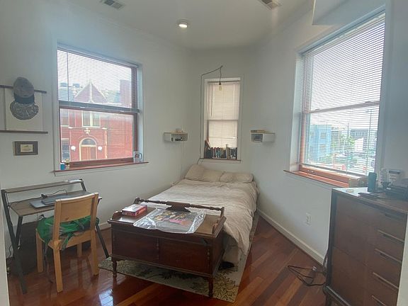 Corner room furnished wide-angle (has closet and attic storage)