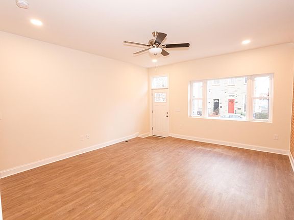 living room exposed brick well lit