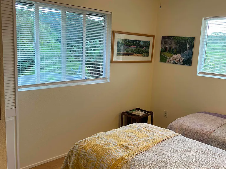 entrance to 2nd bedroom with big corner windows