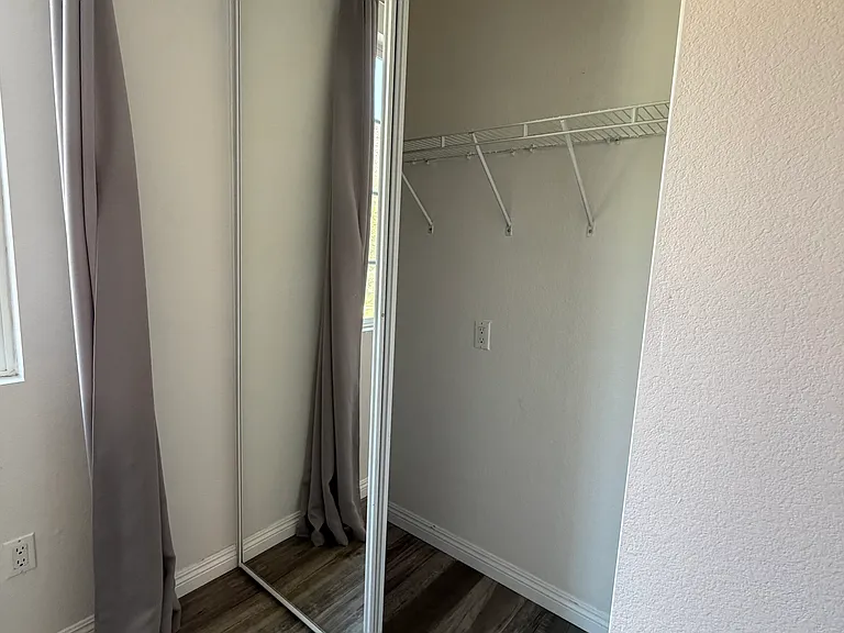 Comfortable second bedroom with spacious closet.