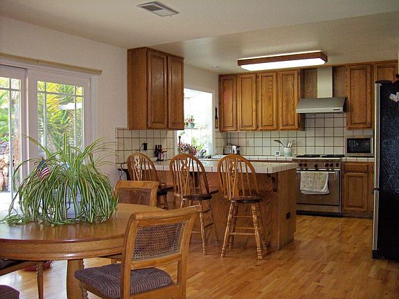 Large kitchen w/ lovely red oak floors