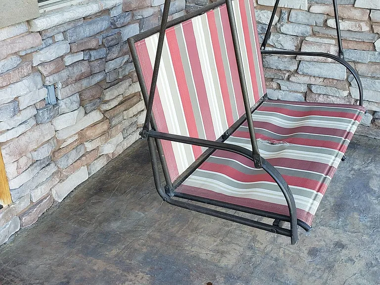 Welcoming front porch with swing