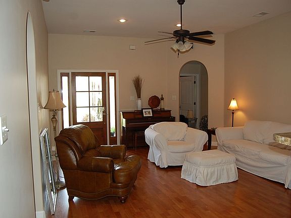Living Room with arched doorsways