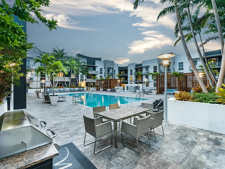 Escape poolside at Modera Douglas Station in a private bungalow or dine al-fresco with our outdoor kitchen.