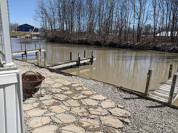 Channel side patio with dock