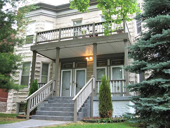Front of Building with Second Floor Porches