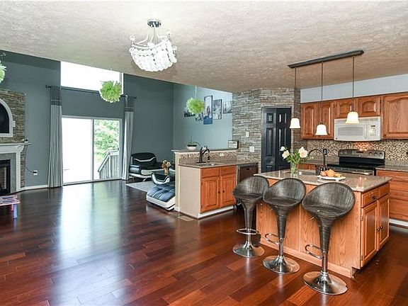 The open floor plan, of the kitchen and living room, is great for entertaining family and friends.