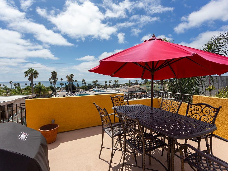 ROOFTOP DECK WITH OCEAN AND SUNSET VIEWS AND SEATING FOR 6
