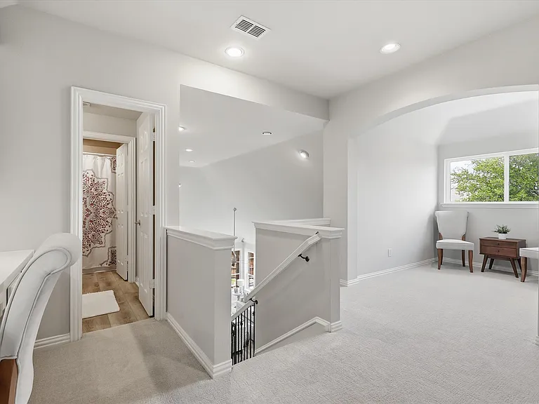 Private nook in loft for crafting or additional home office.