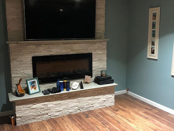 Brand New Cozy Fireplace w/ 70_ Flat screen TV