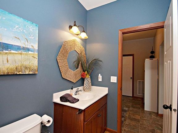 Convenient walk-thru main floor bathroom...