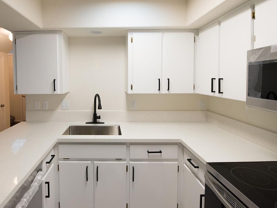 All kitchen appliances, sink, faucets and top quality quartz countertop are brand new.