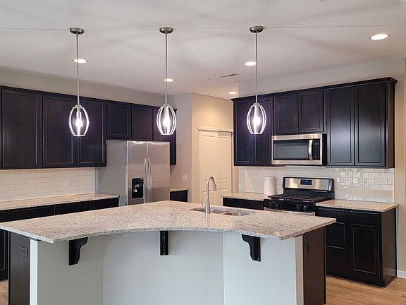 Kitchen with spacious granite countertop