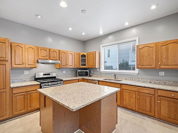 Kitchen with Granite Counters and Island