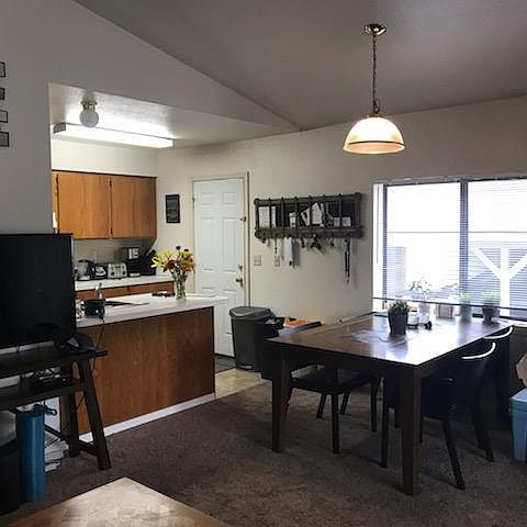 Kitchen and Dining area. Access door to kitchen and another door to the Living room.