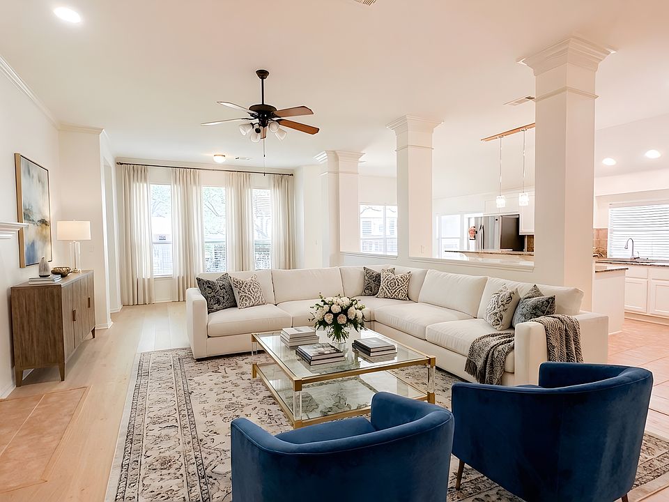 Spacious 2025 modern living area; virtually staged to highlight the sprawling single-story flow and pristine French Oak-style flooring.