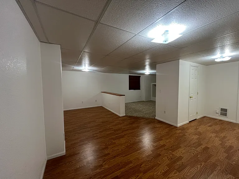 Family/entertainment room in basement