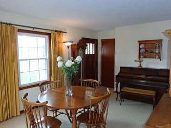 Foyer leads into the dining room.