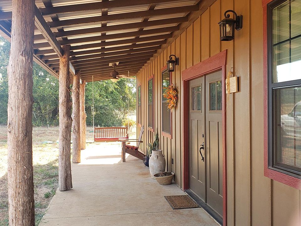 Full length front porch with swing.