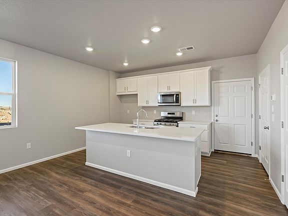 The Woodland floorplan, images taken at Vive on Via Varra