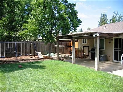 Huge backyard! There's a great play area, and lots of patio for backyard BBQs.