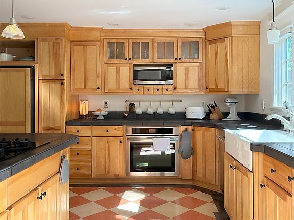 This photo is taken from the dining room doorway, looking into the kitchen.