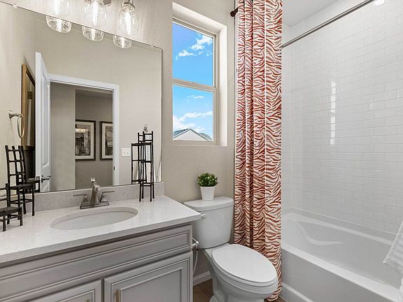 Second bathroom near bedroom 2 offering guest privacy
