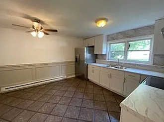 Kitchen with view of the front