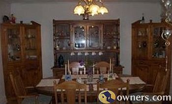 Dining room - two corner cabinets go with the sale.