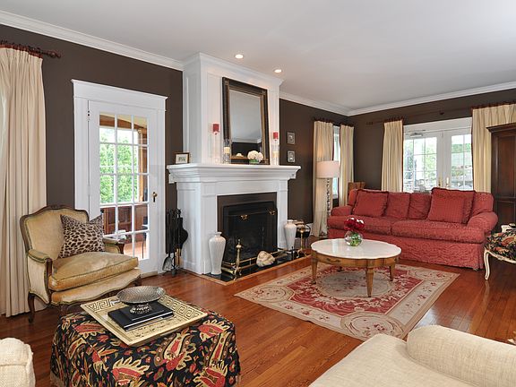 Living room with french doors out to patio and pool area